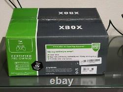 Microsoft Xbox One X with 2 controllers & 1 year warranty on Console & GameStop