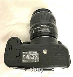 Nikon D3100 14.2MP Digital SLR Camera with 18-55 mm lens. One Year Warranty