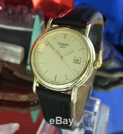 Tissot 18 K Gold Date Watch Eta Movement- G617.330 midi 26 mm One year Warranty